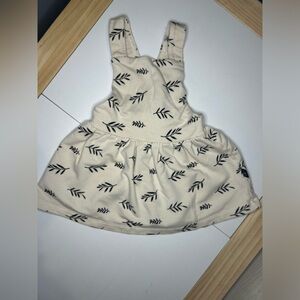 Cream Baby Dress With Black Leaf Print